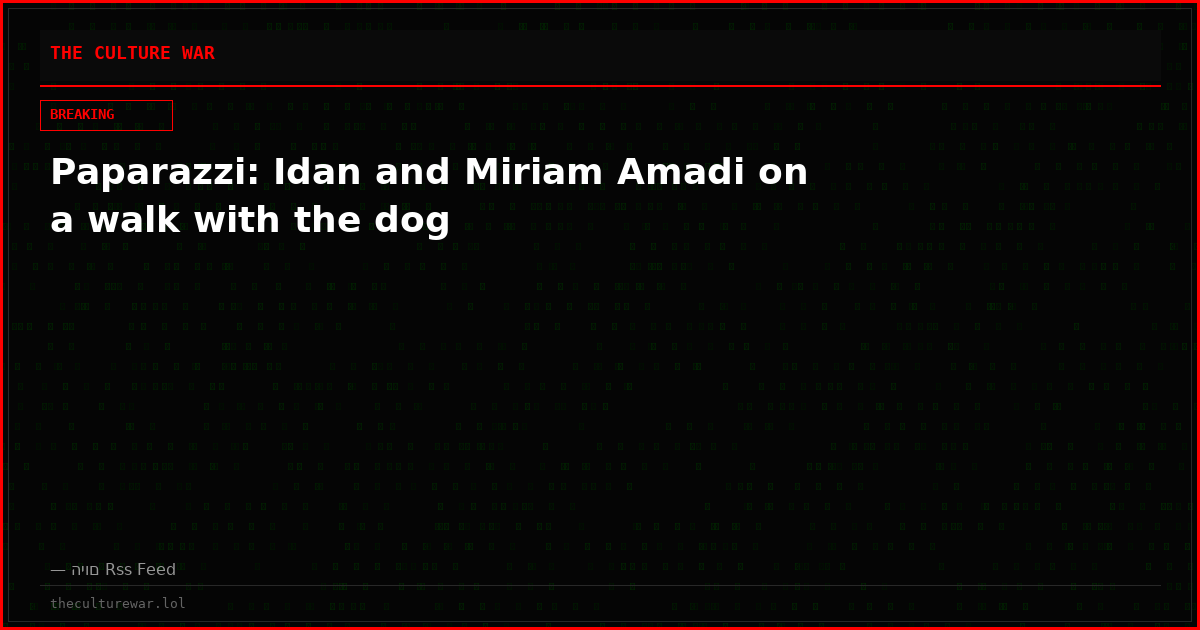 Paparazzi: Idan and Miriam Amadi on a walk with the dog